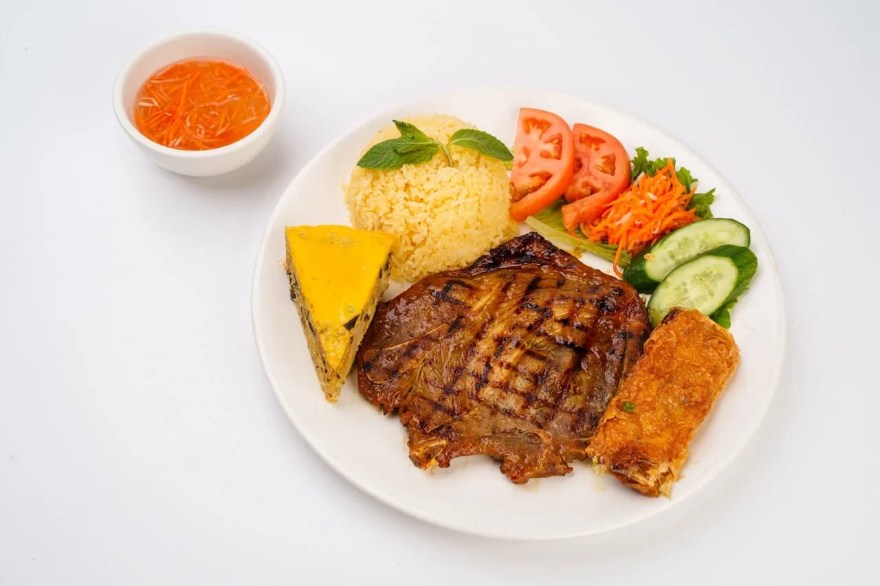 Rice Plate with Egg Quiche, Charbroiled Pork Chop, and Shrimp Patty
